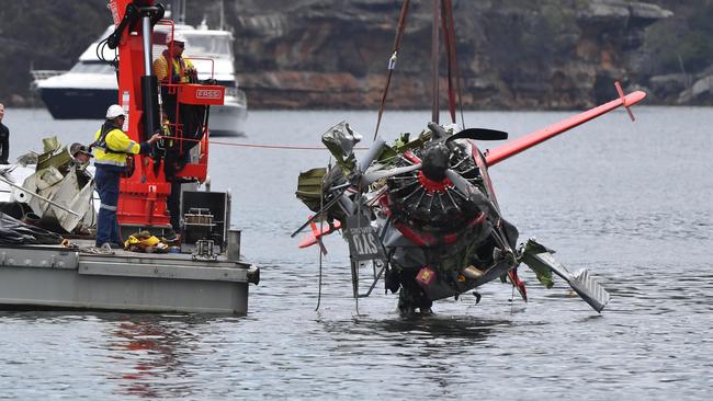 NSW police and salvage personnel recover the wreckage. Picture: AAP