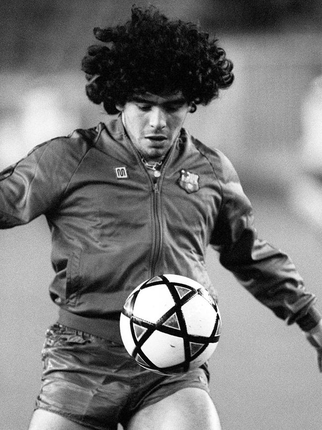 Argentinian soccer player Diego Maradona wearing the color of FC Barcelone, during a friendship match against Paris Saint Germain, in 1982 in Paris.