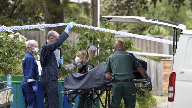 One of Lee’s victims is removed from a Mordialloc property. Picture: Andrew Henshaw