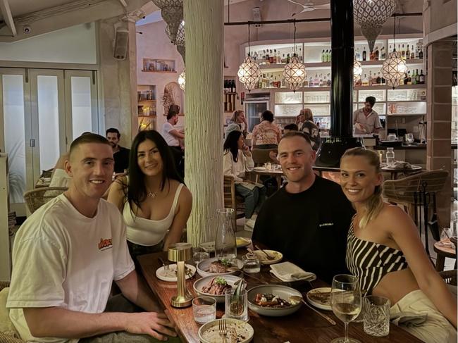 Tom Mitchell with Tayla Brown and Darcy Cameron with fiancee, Adriana Guevara Paez, in Byron Bay. Picture: Instagram