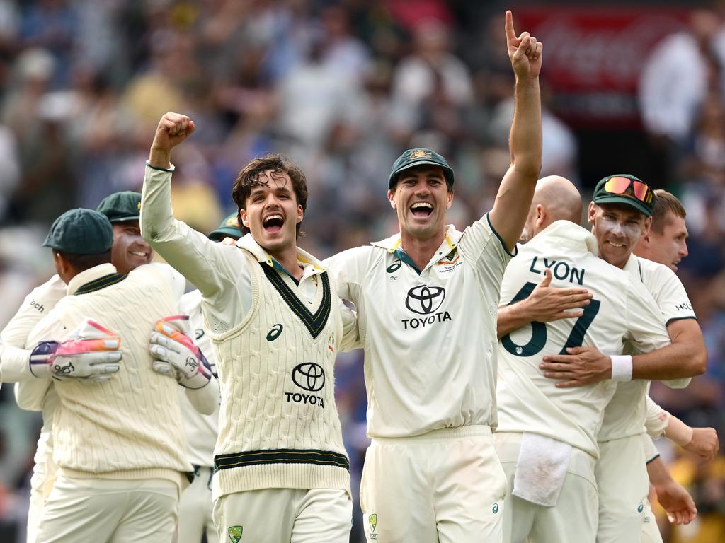 Konstas and captain Pat Cummins celebrate Australia’s Boxing Day Test victory. Picture: Getty