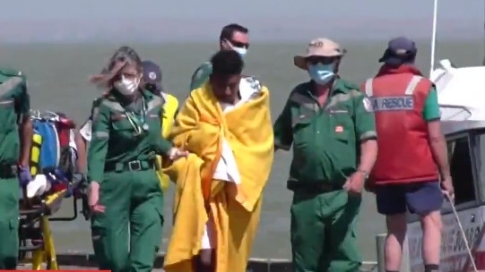 A man has been rescued but another is still missing after a canoe capsized on Lake Alexandrina, near Milang. Picture: Nine News