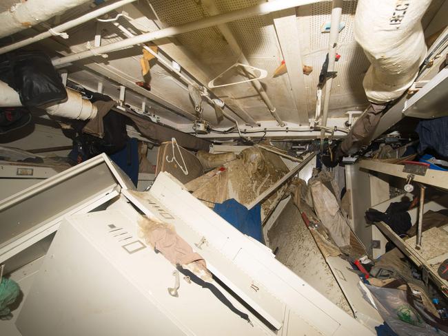 Obstacle course ... USS Fitzgerald’s Berthing 2, after it was drained in harbour. The survival of the 35 sailors in this room at the time of impact depended on split-second timing. Picture: USN.