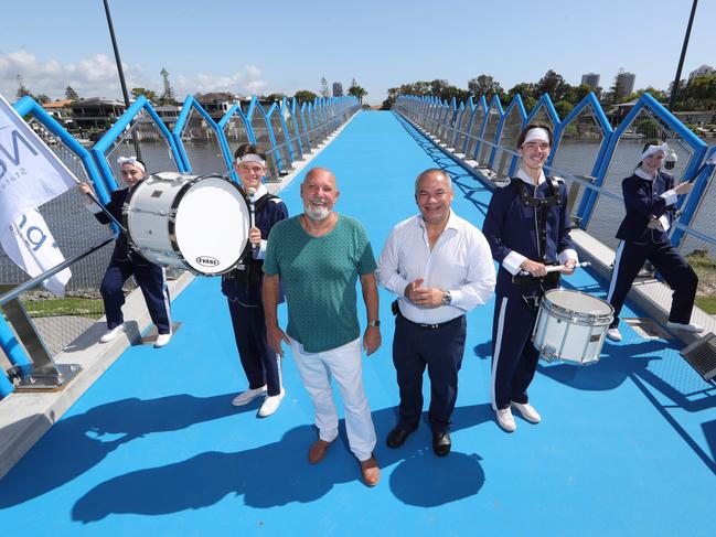 Getting ready for the opening of the Green Bridge at Evandale are from left Paige Faulkner, Andrew Stoner, Mayor Tom Tate, Geoff Smith from Chevron Island Business Association and other Nerang State High School  drumline players Brody Winwood and Jaycee Tapara , who will be there for the community day on Sunday 2 February. Picture Glenn Hampson