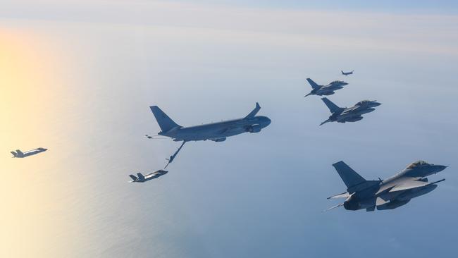 Royal Australian Air Force F-35A Lightning II and Republic of Korea Air Force KF-16U Fighting Falcon aircraft conduct air to air refuelling during Exercise Pitch Black.