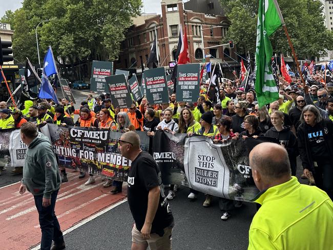 CFMEU workers march in Sydney on October 26, 2023, demanding a ban on engineered stone products. The march comes one day before health ministers meet to consider a ban on the common household products, which has been shown to pose health risks to stone masons. Picture: Supplied