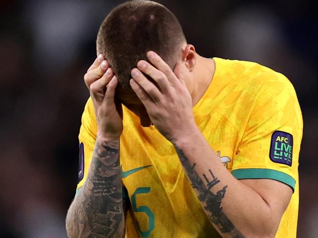 AL WAKRAH, QATAR - FEBRUARY 02: Mitchell Duke of Australia stands dejected following defeat after extra time during the AFC Asian Cup quarter final match between Australia and South Korea at Al Janoub Stadium on February 02, 2024 in Al Wakrah, Qatar. (Photo by Robert Cianflone/Getty Images)