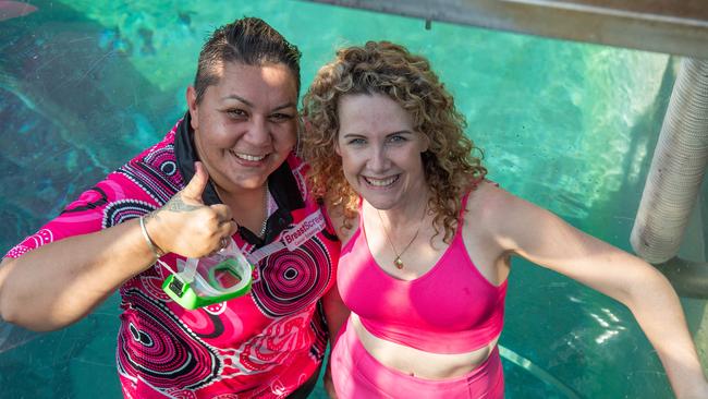 BreastScreen NT representative Natalie Stokes and Breast cancer survivor Belinda Kolstad entering the cage of death at the Crocosaurus Cove, Darwin. Picture: Pema Tamang Pakhrin