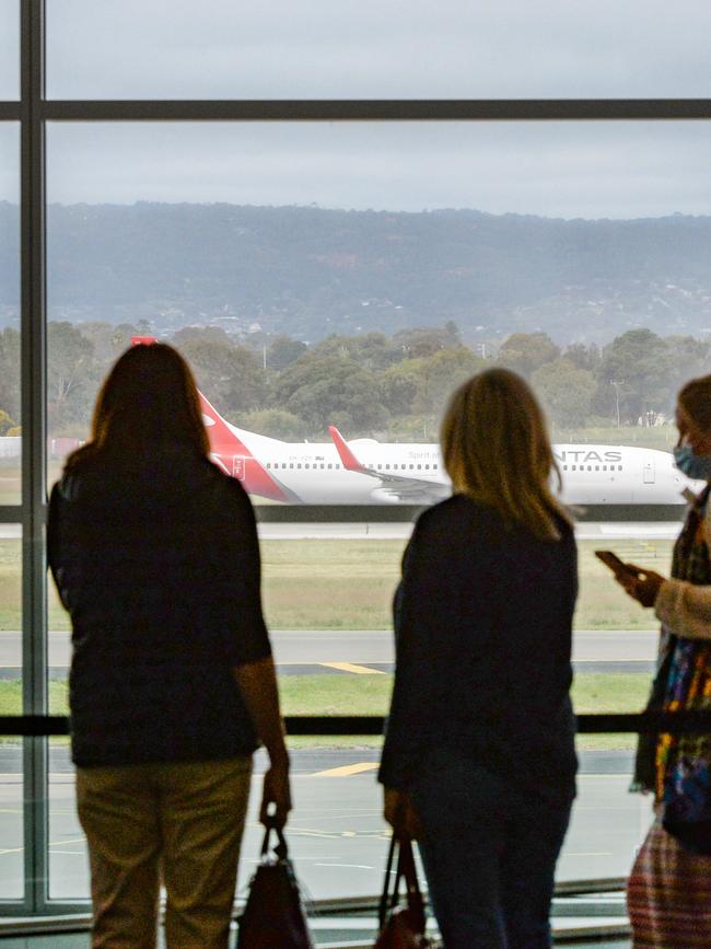 Travellers at Adelaide Airport. Picture: NCA NewsWire /Brenton Edwards