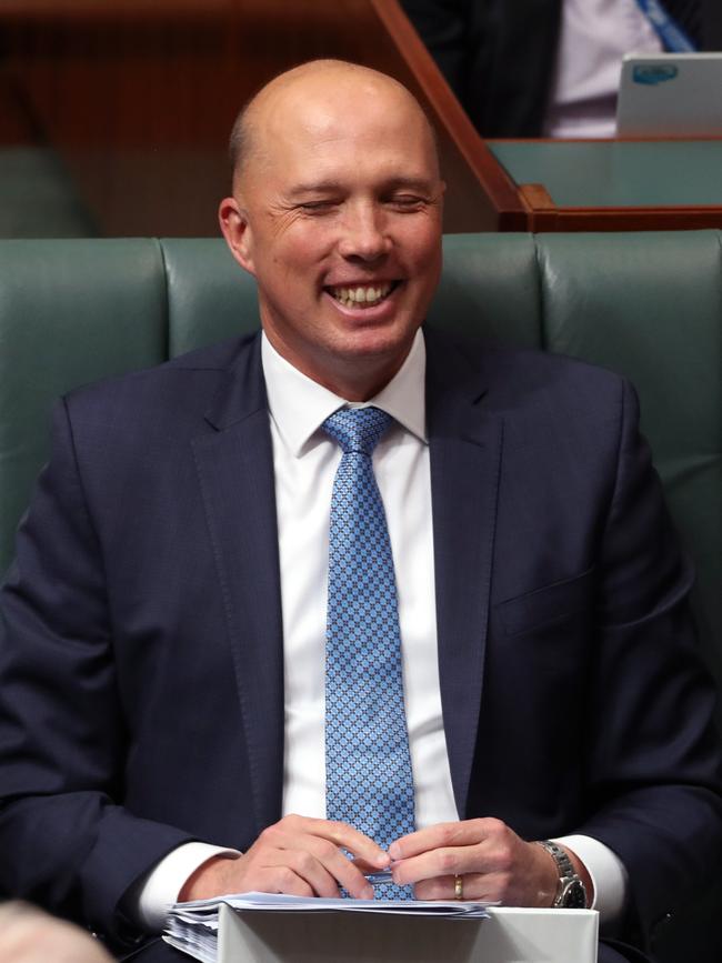 Peter Dutton has a laugh with colleagues on Monday. Picture: Gary Ramage