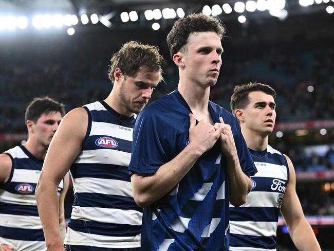 MELBOURNE, AUSTRALIA - SEPTEMBER 21: Max Holmes of the Cats looks dejected after full time during the AFL Preliminary Final match between Geelong Cats and Brisbane Lions at Melbourne Cricket Ground, on September 21, 2024, in Melbourne, Australia. (Photo by Quinn Rooney/Getty Images)