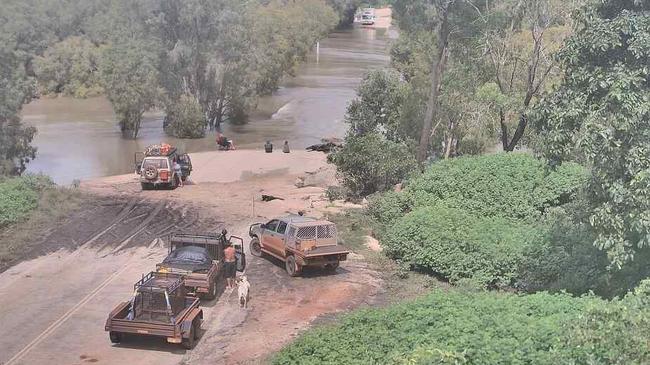 Travellers on the Peninsula Development Road last month wait at the Archer River for the water level to drop before crossing. Picture: Supplied