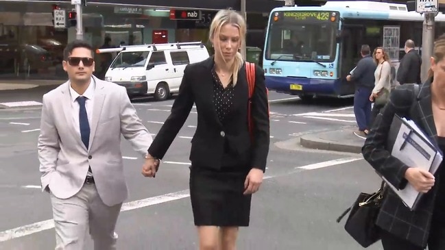 RAW: Couple charged over Syd samurai sword murder arrive at court