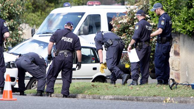 Police undertook a thorough forensic investigation after Michael McGurk was shot outside his Cremorne home in front of a young relative. Picture: Jeff Herbert