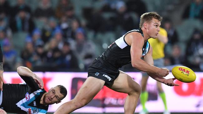 A disappointing 26,137 people braved the conditions at Adelaide Oval to watch Ollie Wines and his Power teammates blast the Western Bulldogs on Thursday night. Picture: AAP Image/David Mariuz