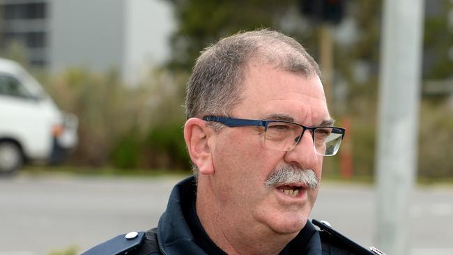 Assistant Commissioner Glenn Weir at the intersection of Dohertys and Forsyth Roads in Truganina where four people were killed in a head on collision last night. Picture: Andrew Henshaw