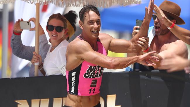 Ali Day celebrates winning the Nutri-Grain Ironman series at Kingscliff on February 28, 2021 in Kingscliff, Australia. (Photo by Chris Hyde/Getty Images)