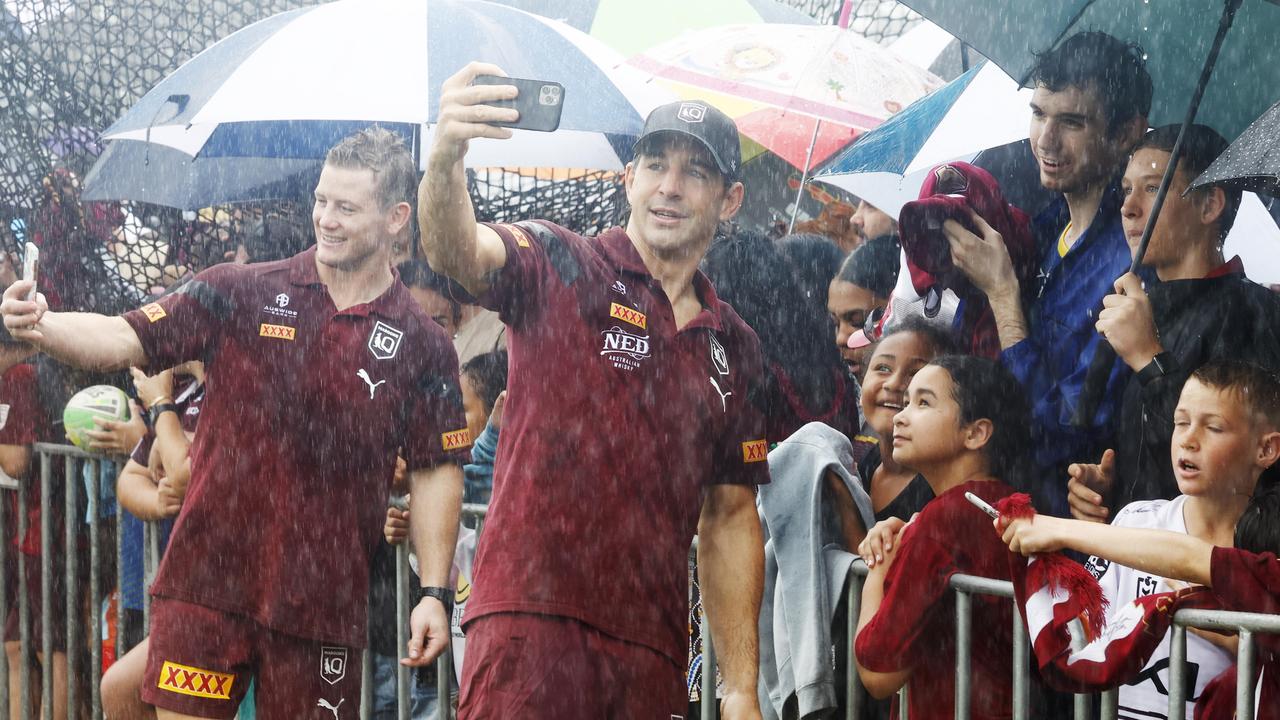 Queensland players braved the rain to take part in a fan day. Picture: Brendan Radke