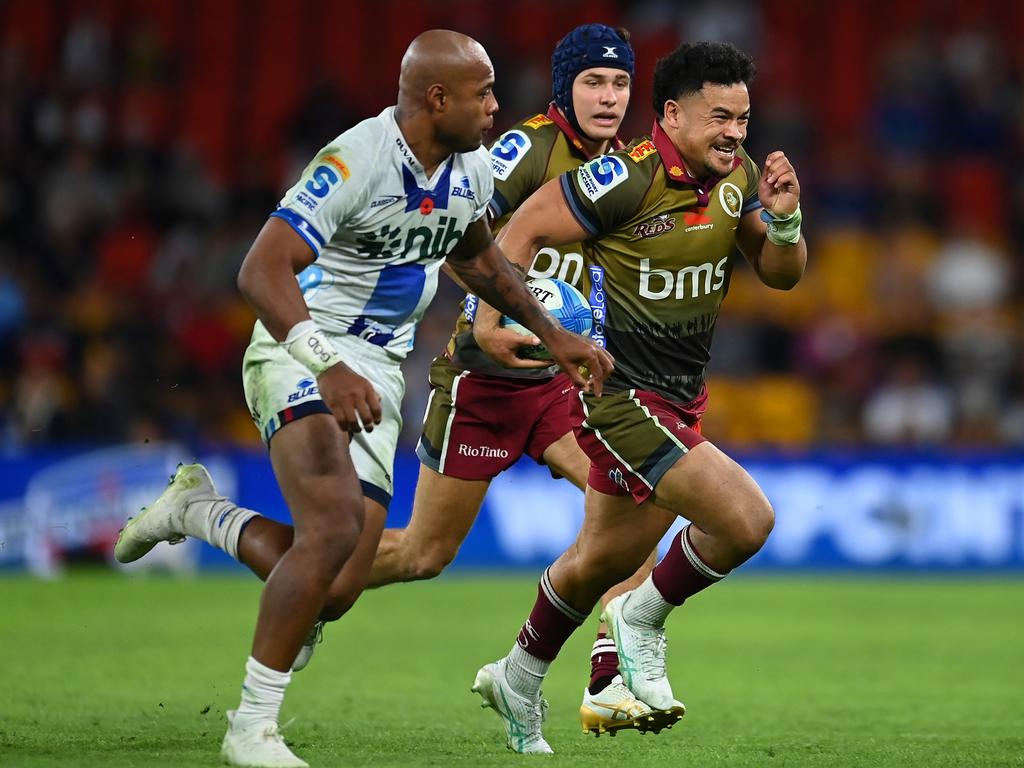 Hunter Paisami (right) has signed a new deal with the Reds and Rugby Australia. Picture: Albert Perez/Getty Images