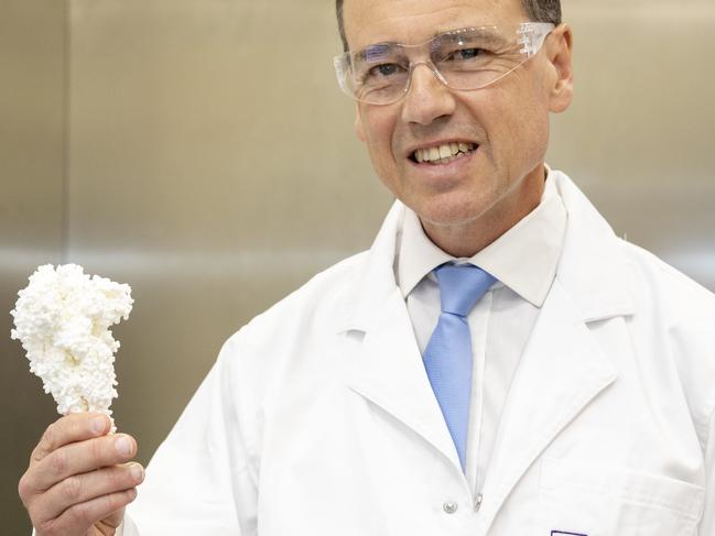 Federal Health Minister Greg Hunt MP holds a model of for a COVID-19 vaccine during a visit to the National Biologics Facility at the University of Queensland, St Lucia. Picture: NCA NewsWire / Sarah Marshall