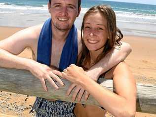 STAYING COOL IN BARGARA: Ronan Corcoran and Laura Kirby making the most of the local beaches during their travels along the east coast of Australia. Picture: Mike Knott BUN180219WEA1