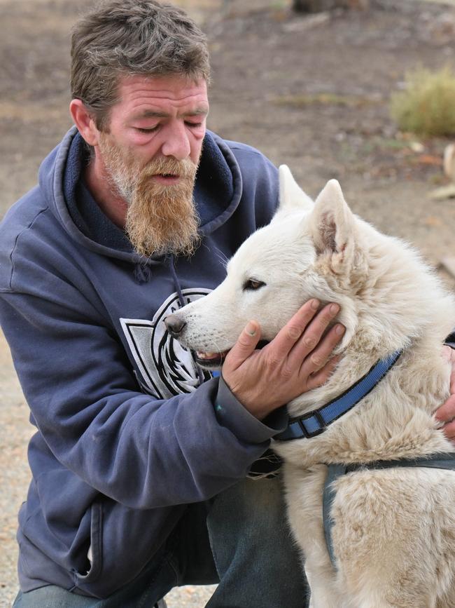 David Wallace, friend of Sean Ferris, with Buddy. Picture: Brenton Edwards