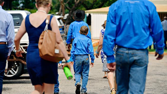 Family and friends arrive at Casuarina Street primary school for Dolly Everett's memorial service in Katherine, Northern Territory.