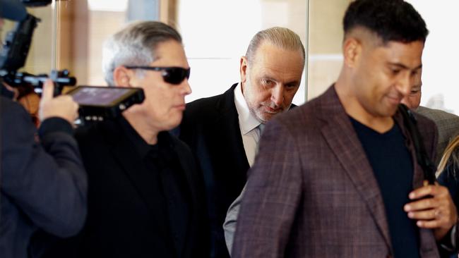 Brian Houston (centre) arrives with his supporters at the Downing Centre Local Court on Thursday. Picture: NCA NewsWire / Nikki Short