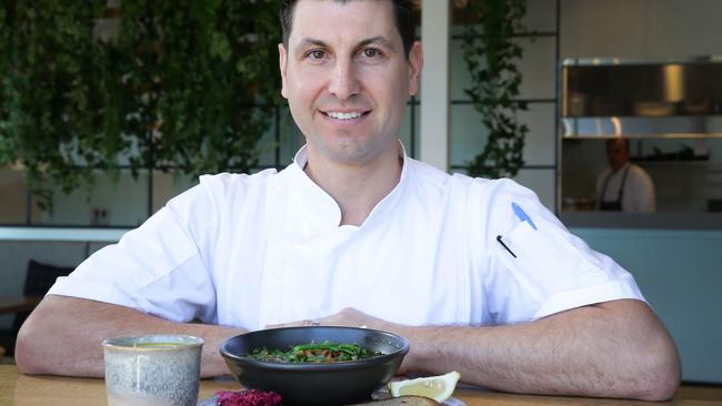 Anthony Milotic with his broth. It’s served with seasonal greens and cultured kraut.