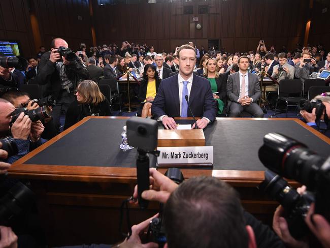 A huge media pack was waiting for Facebook CEO Mark Zuckerberg. Picture: AFP