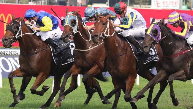 Rustic Steel (tartan cap) can break through for a well-earned win in The Coast. Picture: Grant Guy