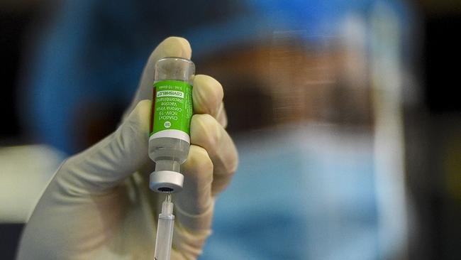 An army health worker prepares a dose of AstraZeneca. Picture: AFP