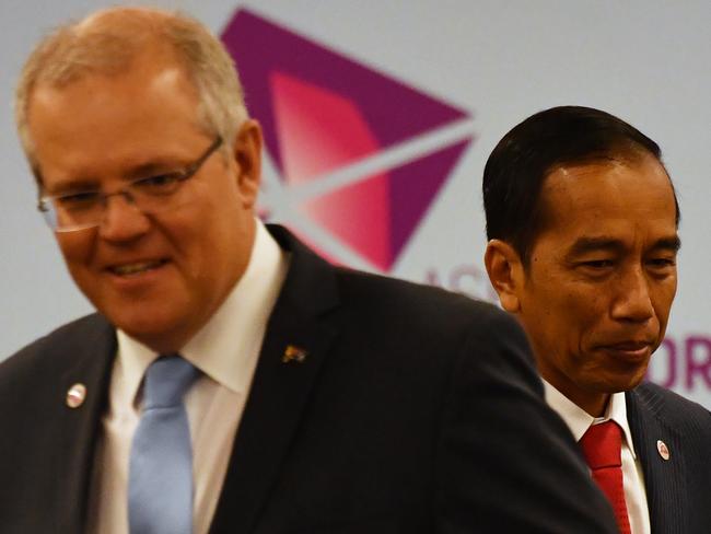 Australia's Prime Minister Scott Morrison and Indonesia's President Joko Widodo at the ASEAN Summit in Singapore on Wednesday. Picture: AAP