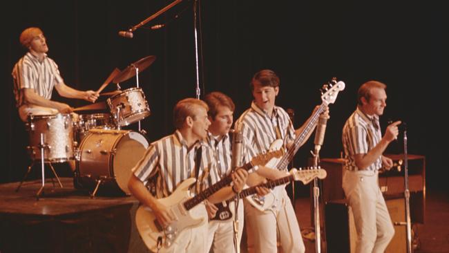 The Beach Boys in 1964: Dennis Wilson, Al Jardine, Carl Wilson, Brian Wilson and Mike Love.