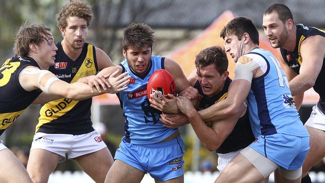 Sturt’s James Battersby under pressure. Picture: SARAH REED