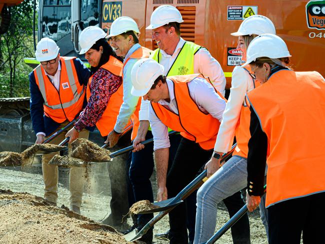 Premier Steven Miles (centre), ministers and MPs turn sodes on the new Bundaberg hospital on Wednesday. Picture: Paul Beutel