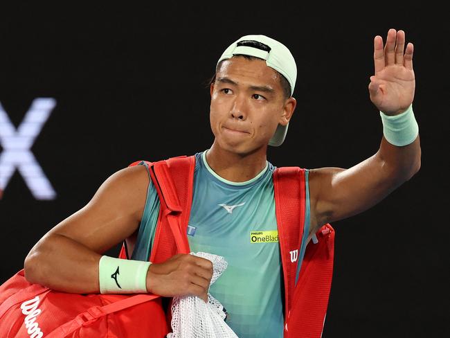 Australia's Li Tu walks off the court after losing the men's singles match against Czech Republic's Jiri Lehecka. Picture: David GrayAFP.