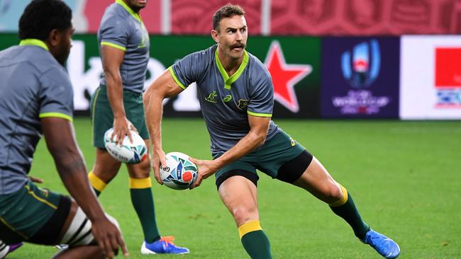 Test halfback Nic White has returned to Australia and hopes to win a Test spot