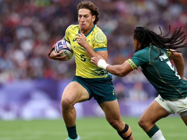 Mark Nawaqanitawase representing Australia during the Paris Olympics. Picture: Cameron Spencer/Getty Images