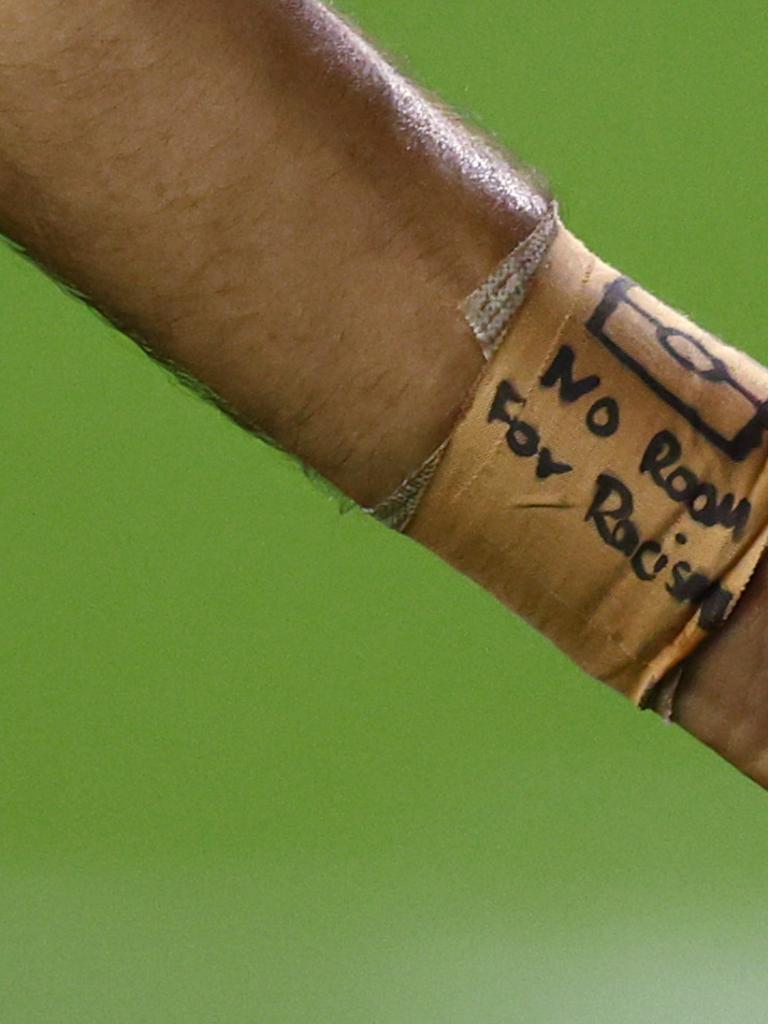 ‘No Room For Racism’ written on the wrist tape of Eddie Betts of the Blues. Picture: Michael Klein