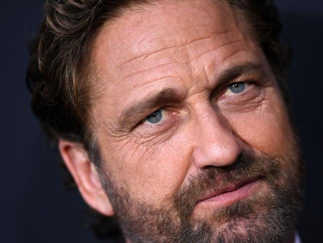 (FILES) In this file photo taken on August 20, 2019 (FILES) In this file photo taken on August 20, 2019 Scottish actor Gerard Butler arrives for the Los Angeles premiere of "Angel Has Fallen" at the Regency Village theatre in Westwood, California. - Lionsgate's political thriller "Angel Has Fallen" didn't quite soar but managed to stay atop the North American box office on this US holiday weekend, industry watcher Exhibitor Relations reported on September 1, 2019. The action-packed film took in an estimated $11.6 million for the first three days of Labor Day weekend and $14.5 million for the four-day period. That came at the end of a summer that saw movie revenue dip by 2 percent from last year, the Comscore website said. (Photo by VALERIE MACON / AFP)