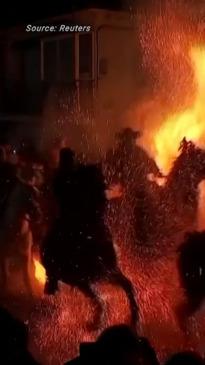 Horses leap over huge bonfires in Spanish festival