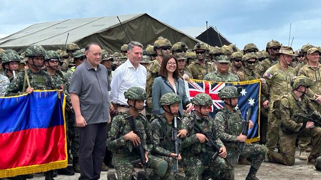 Australian Defence Minister Richard Marles (centre) after Exercise Alon saw the combined armies storm a beach off Zambales, in the northern Philippines. The assault was launched from HMAS Canberra.