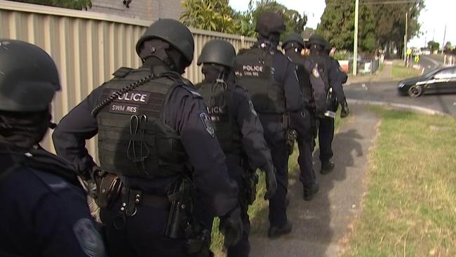 Police swarmed the properties as the investigation heated up. Picture: NSW Police