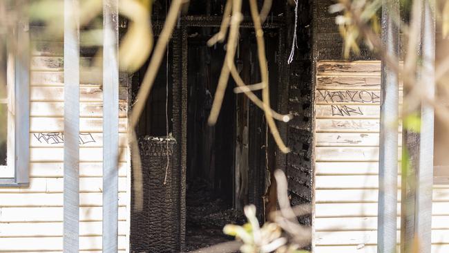 A cluster of abandoned houses - including one which has been damaged by fire - are causing concerns in Croydon. Photo: Daniel Pockett