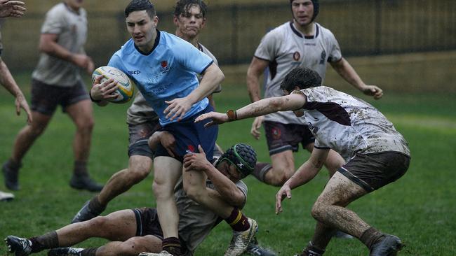 NSW's Jay Ingleton with the ball against Queensland 2 at the Australian School Rugby Championships at Knox Grammar. Pic: John Appleyard