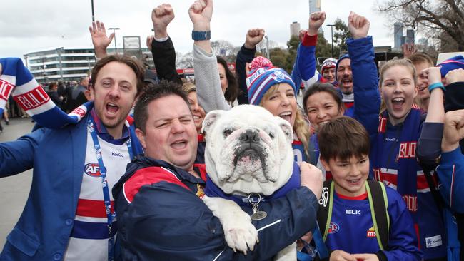 Jerome Murnane and Sid before last year’s grand final victory. Picture: David Crosling