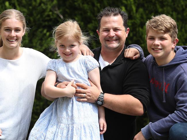 Pride of Australia entrant and police investigator Simon Gillard at home with his children Lily, Adella and Cooper in Wahroonga, Sydney. Picture: Brett Costello