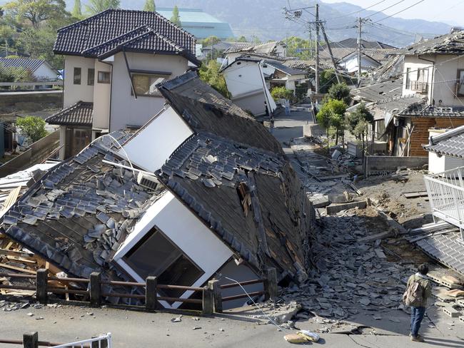 Houses are seen destroyed after an earthquake in Mashiki, Kumamoto prefecture, southern Japan. Picture: Ryosuke Uematsu/Kyodo News.