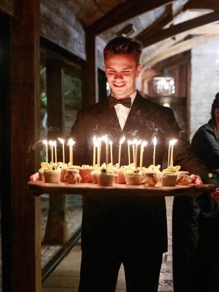 Romeo Beckham carrying the cupcakes. Photo: Instagram